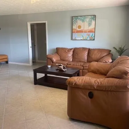 Buy this 2 bed house on 6746 Oscala Avenue in Lakewood Park, FL 34951