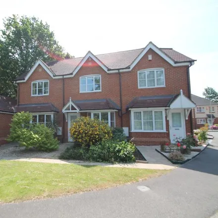Rent this 2 bed townhouse on Green Lane in Sindlesham, RG41 5FE