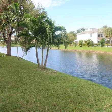 Rent this 2 bed apartment on 5659 Courtyard Drive in Margate, FL 33063