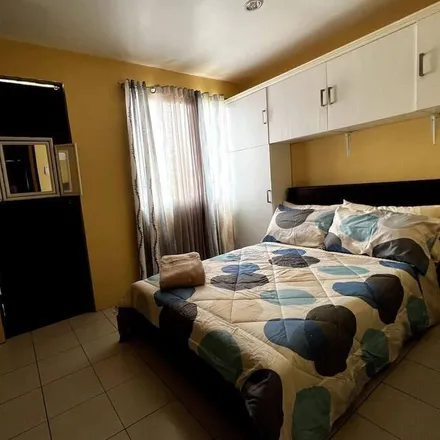 Rent this 3 bed house on Talisay Town Center in Tabunok, Cebu