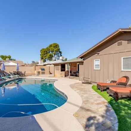 Rent this 4 bed house on 7323 East Lewis Avenue in Scottsdale, AZ 85257
