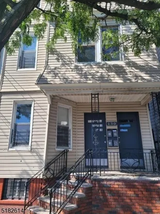 Rent this 3 bed townhouse on Park Avenue Food Market in 7004 Ridge Street, Newark