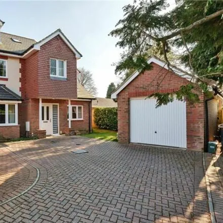 Buy this 4 bed house on Hawthorn Gardens in Caterham on the Hill, CR3 5HW