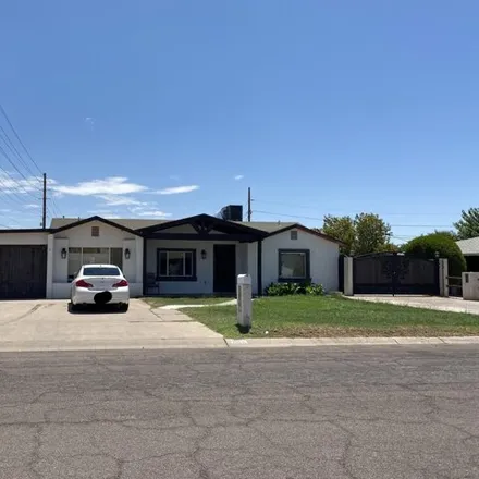 Buy this 4 bed house on 2303 West Marshall Avenue in Phoenix, AZ 85015