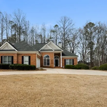 Buy this 5 bed house on 5055 Hickory Hills Dr in Woodstock, Georgia