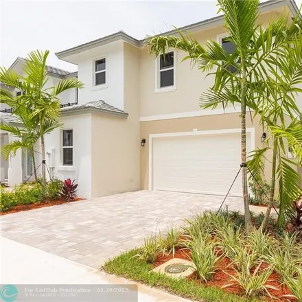 Rent this 3 bed townhouse on 7199 Hollywood Boulevard in Pembroke Pines, FL 33024