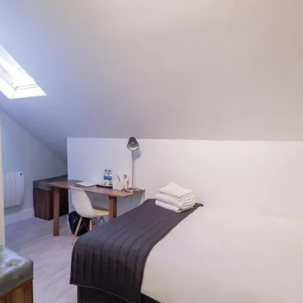 Rent this 1 bed apartment on Kentish Town Collective in 261 Camden Road, London