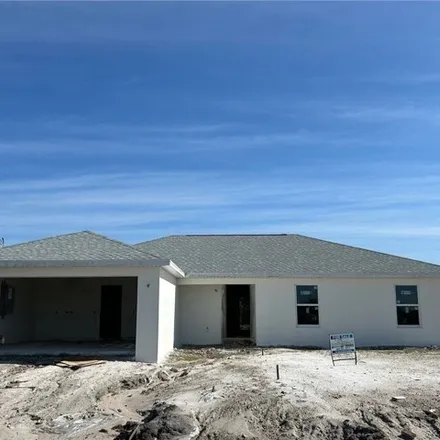 Buy this 4 bed house on 381 Northwest 23rd Avenue in Cape Coral, FL 33993