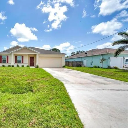 Rent this 4 bed house on 5806 Gerald Drive West in Port Saint Lucie, FL 34986