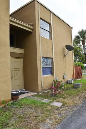 Rent this 2 bed condo on 3056 W Missionwood Ln Unit C-II in Miramar, Florida