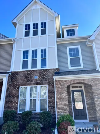 Rent this 3 bed townhouse on 1214 Alston Forest Drive