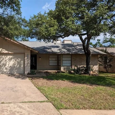 Rent this 4 bed house on 10032 Woodland Village Drive in Austin, TX 78750