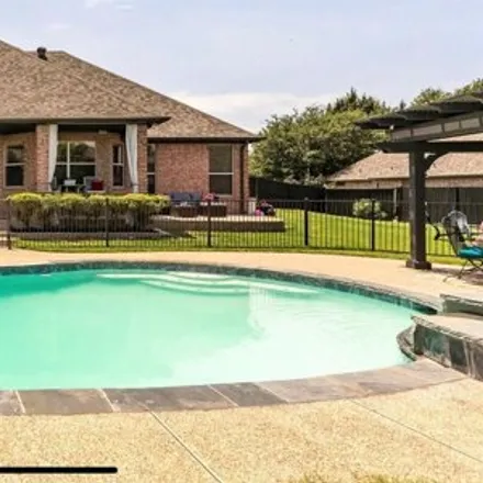 Rent this 4 bed house on 256 Applewood Lane in Haslet, TX 76052