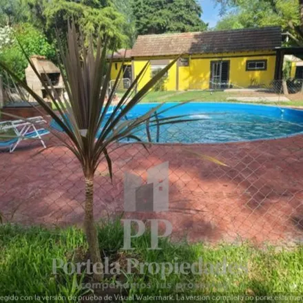Buy this 4 bed townhouse on Reverendo Padre Fahy in Villa Monsegur, B1738 GTD Moreno