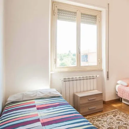 Rent this 3 bed room on Via Giovanni Battista Bastianelli in 00133 Rome RM, Italy
