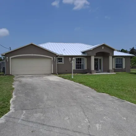 Buy this 4 bed house on 5661 Lorna Court in Port Saint Lucie, FL 34986