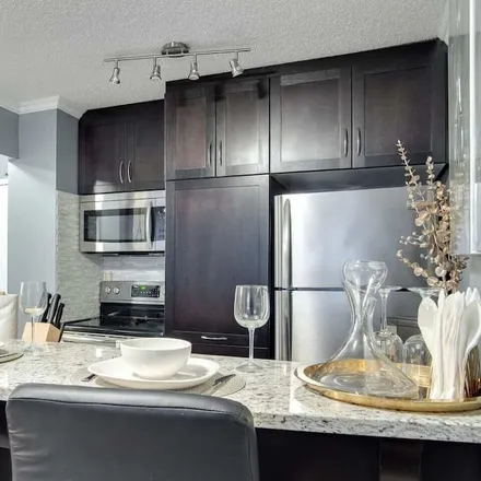 Rent this 1 bed condo on Calgary in AB T2P 0G7, Canada