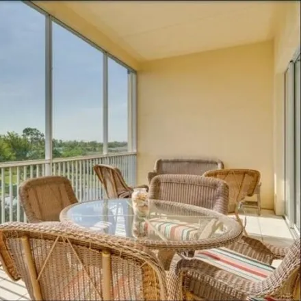 Buy this 2 bed condo on Lakewood Boulevard in Cypress Lake, FL 33919