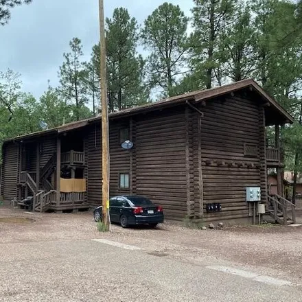 Buy this studio house on Whispering Pines Resort in 237 East White Mountain Boulevard, Pinetop-Lakeside