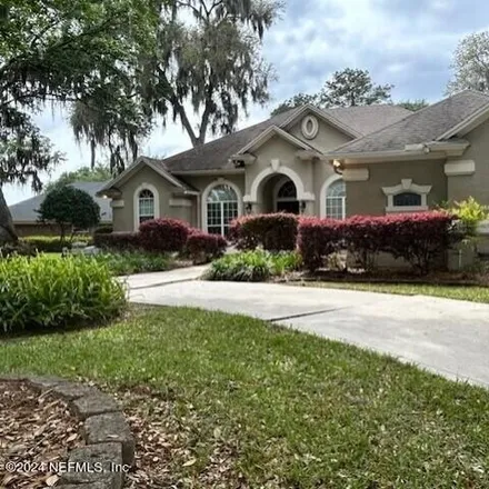 Rent this 4 bed house on Summit Outsourcing in 12028 Rising Oaks Drive, Jacksonville