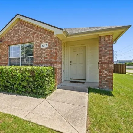 Buy this 4 bed house on 1075 Wood Brook Dr in Grand Prairie, Texas