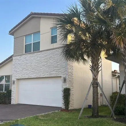 Rent this 4 bed house on Marina Way in Crystal Lake, Deerfield Beach