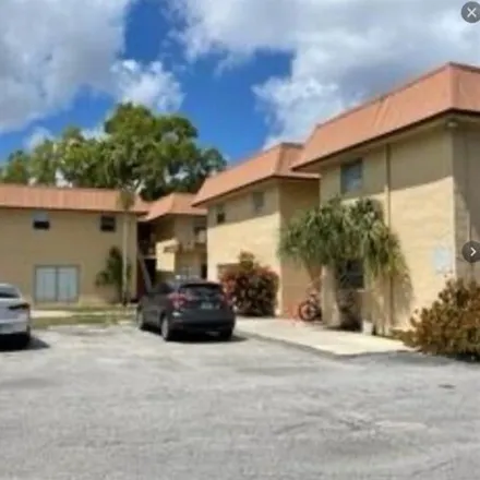 Rent this 1 bed condo on 1550 NW 15th St Apt 14 in Boca Raton, Florida
