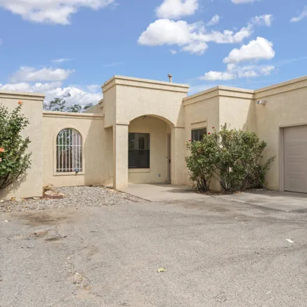 Buy this 3 bed house on 1813 Peach Road Northeast in Rio Rancho, NM 87144