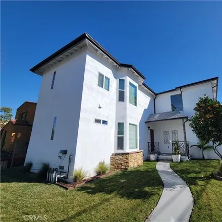 Rent this 4 bed house on 1380 Carmona Avenue in Los Angeles, CA 90019