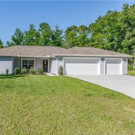 Buy this 4 bed house on 8328 North Saxon Way in Citrus Springs, FL 34434