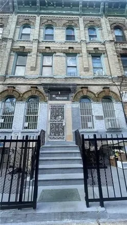 Buy this 12 bed house on 185 Menahan Street in New York, NY 11237