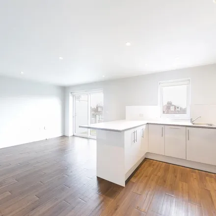 Rent this 3 bed apartment on 255 Burlington Road in London, KT3 4NE