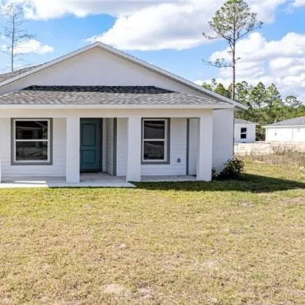 Buy this 3 bed house on 2058 Welby Lane in Lehigh Acres, FL 33972