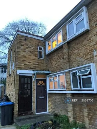 Rent this 4 bed townhouse on Dolphin Close in London, KT6 4DZ