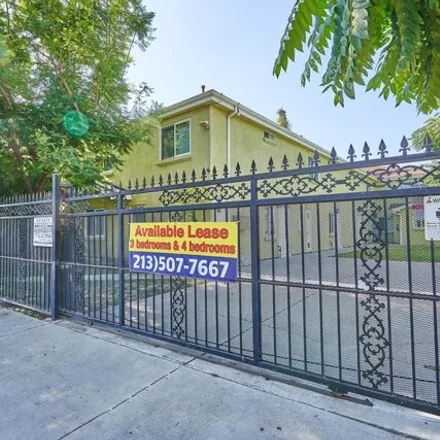 Rent this 3 bed townhouse on 1185 West 36th Street in Los Angeles, CA 90007