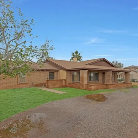 Buy this 4 bed house on 12932 West Peoria Avenue in El Mirage, AZ 85335