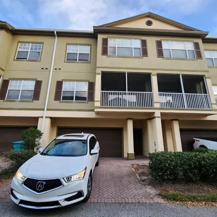 Rent this 2 bed house on 2438 Grand Central Parkway in Orlando, FL 32839