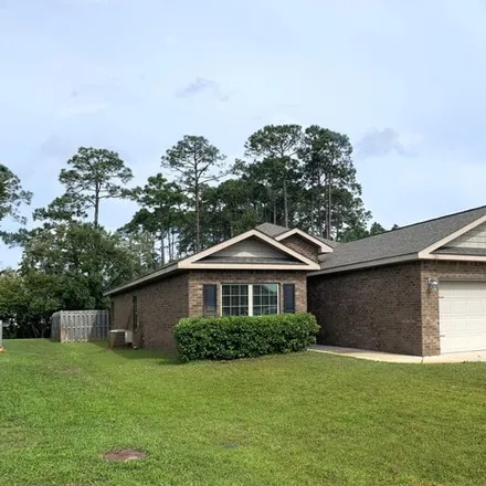 Buy this 4 bed house on 726 Cocobolo Drive in Santa Rosa Beach, FL 32459