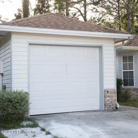 Rent this 3 bed house on 1706 Ashmore Green Drive in Kensington, Jacksonville