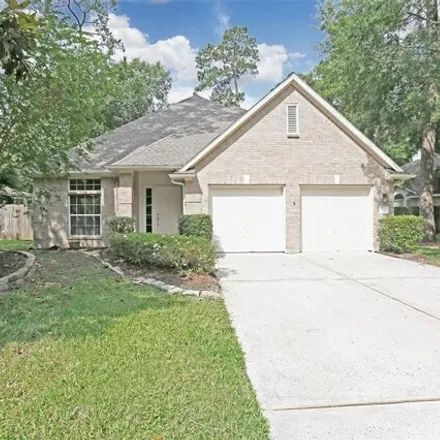 Rent this 3 bed house on 75 Drifting Shadows Circle in The Woodlands, TX 77385