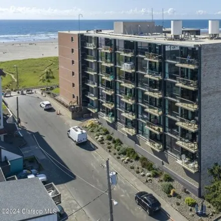 Buy this 2 bed condo on Promenade Condominiums in Avenue E, Seaside