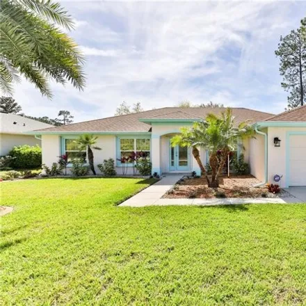 Buy this 4 bed house on 22 Lloshire Path in Palm Coast, FL 32164