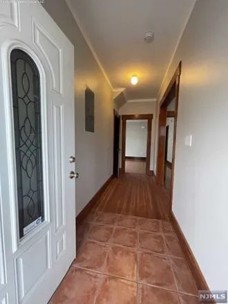 Rent this 3 bed house on 58 Elmwood Place in Elizabeth, NJ 07208