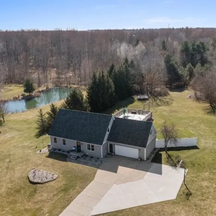 Image 2 - 5404 Dio Drive Northeast, Nelson Township, MI 49319, USA - House for sale