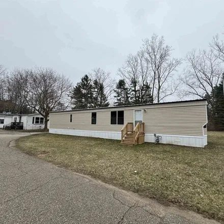 Buy this studio apartment on 5391 Cedar Street in Lexington Township, MI 48422