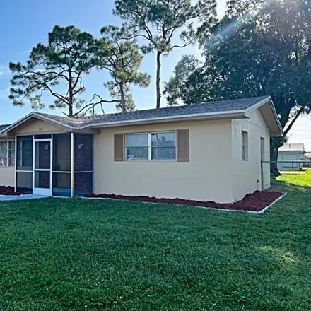 Buy this 2 bed house on 1420 Homestead Road North in Lehigh Acres, FL 33936