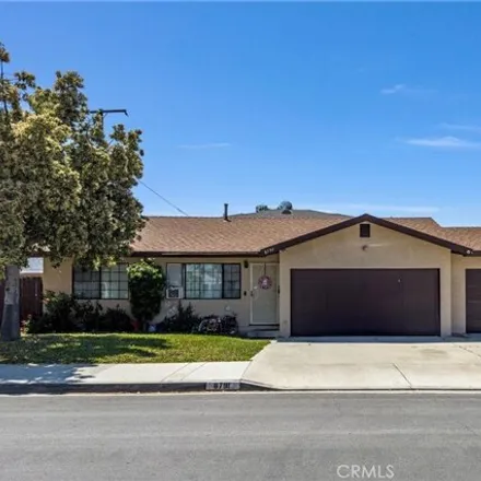 Buy this 5 bed house on 8791 Cypress Avenue in Cypress, CA 90630