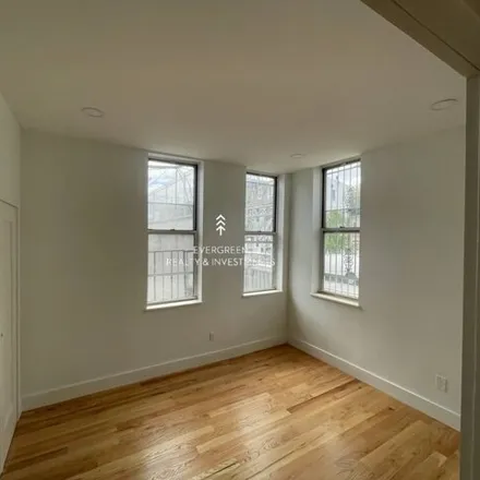 Rent this 3 bed house on 402 Onderdonk Avenue in New York, NY 11385