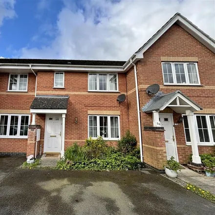 Rent this 3 bed townhouse on Hampton Close in Hugglescote, LE67 4DH