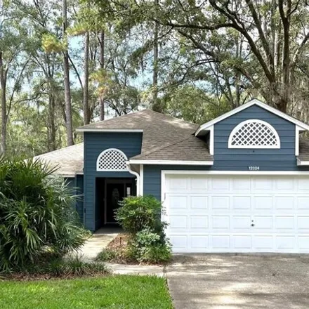 Buy this 3 bed house on 12038 Northwest 8th Place in Alachua County, FL 32669